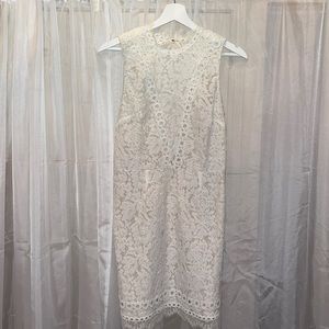 Ivory lace dress with nude lining.